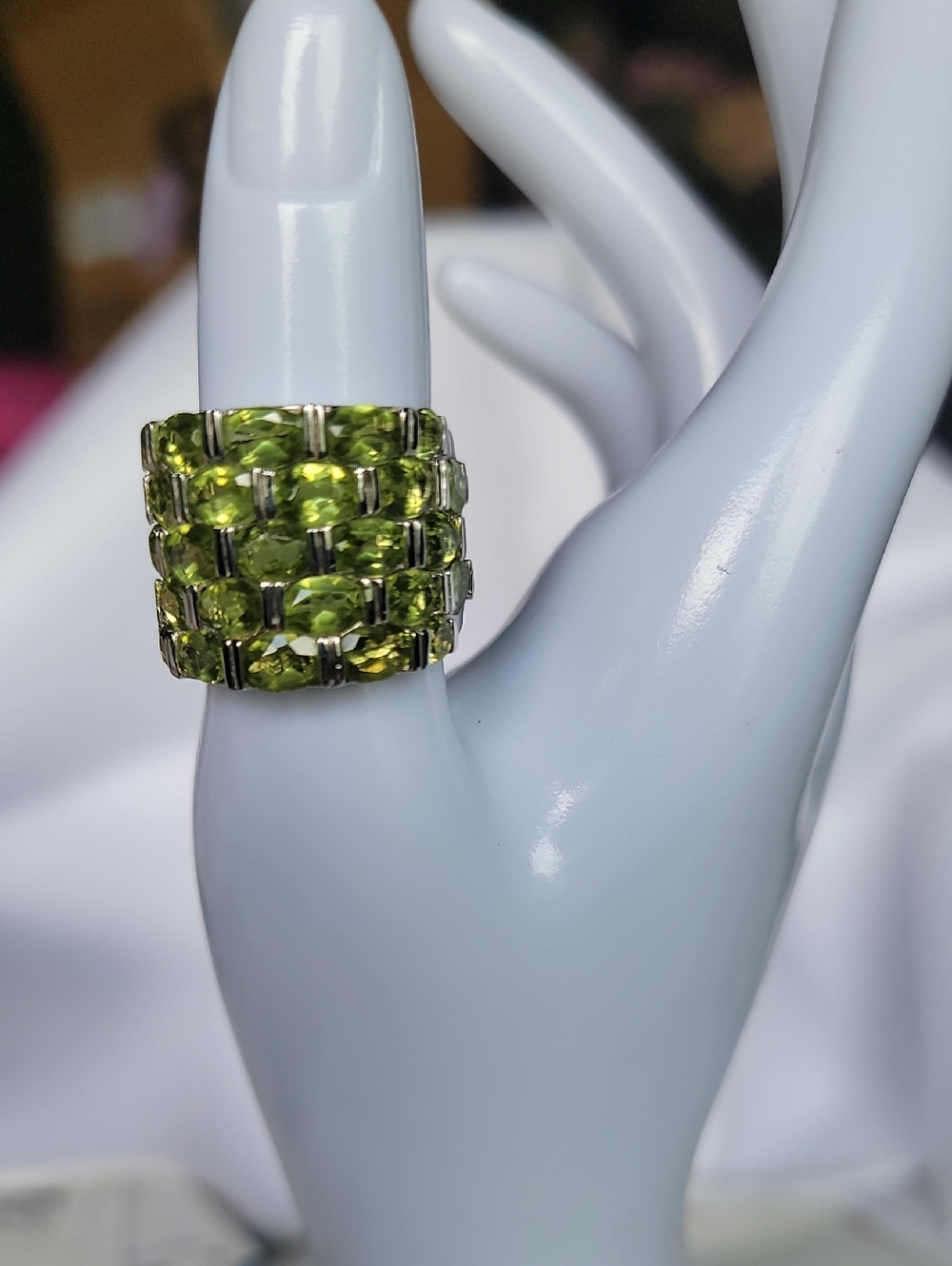 STERLING SILVER MARQUISE SHAPED PERIDOT WOVEN BAND RING